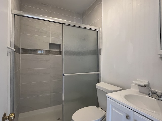 26741 Dartmouth St, Madison Heights, MI 48071 - bathroom featuring a shower stall, vanity, and toilet