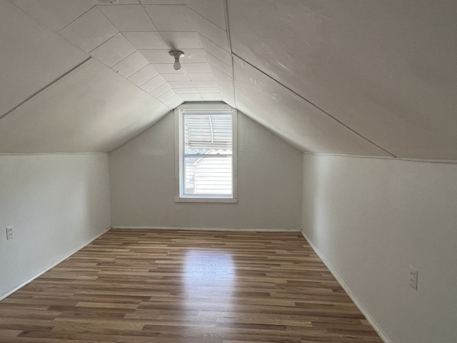 26741 Dartmouth St, Madison Heights, MI 48071 - additional living space featuring wood finished floors, lofted ceiling, and baseboards