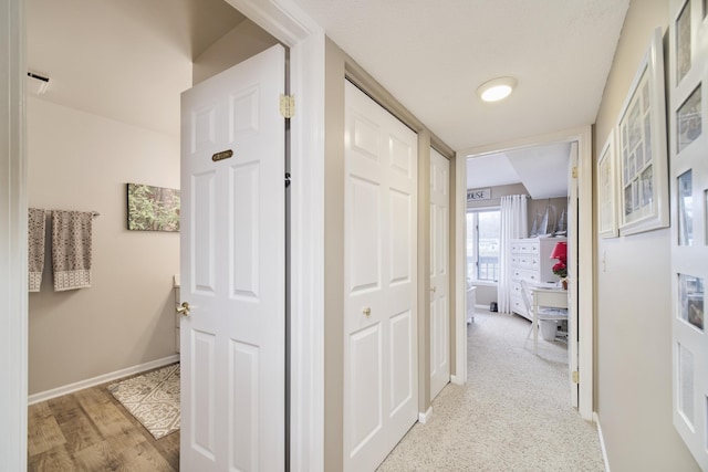 hallway with baseboards
