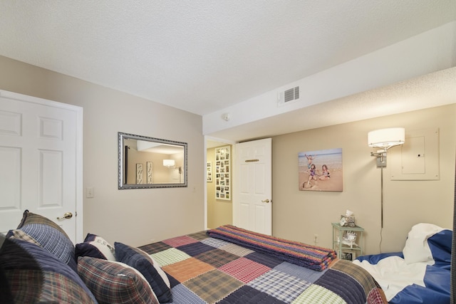bedroom featuring visible vents