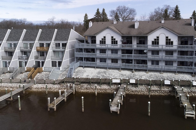 view of property with a water view