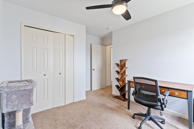 8079 Wildwood Ln, White Lake, MI 48386 - carpeted home office with ceiling fan and baseboards