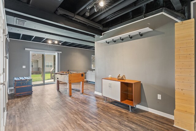 8079 Wildwood Ln, White Lake, MI 48386 - game room with wood finished floors and baseboards