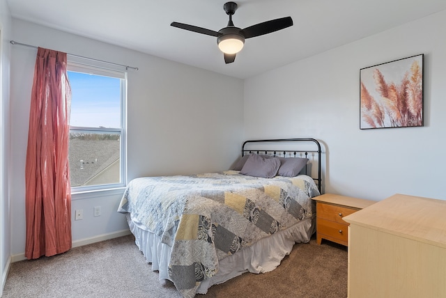 8079 Wildwood Ln, White Lake, MI 48386 - carpeted bedroom with a ceiling fan and baseboards