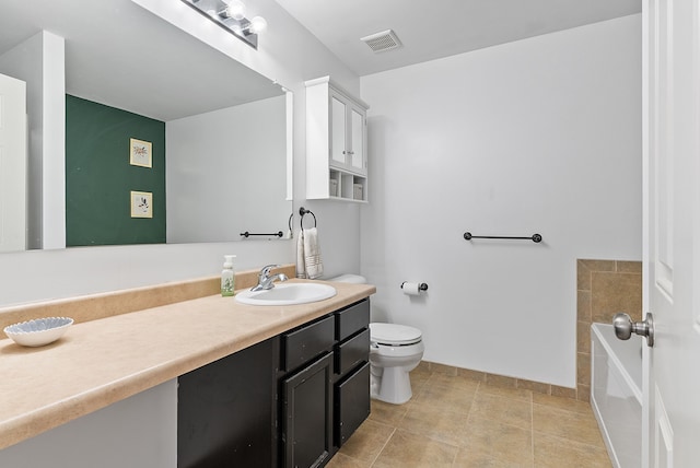 8079 Wildwood Ln, White Lake, MI 48386 - full bathroom with toilet, vanity, baseboards, and a tub to relax in