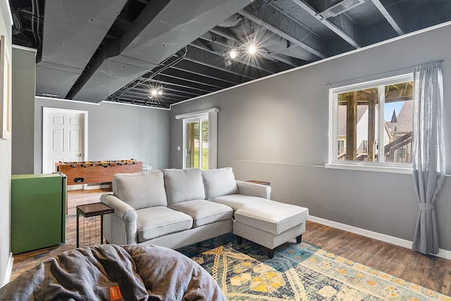 8079 Wildwood Ln, White Lake, MI 48386 - living area featuring wood finished floors and baseboards