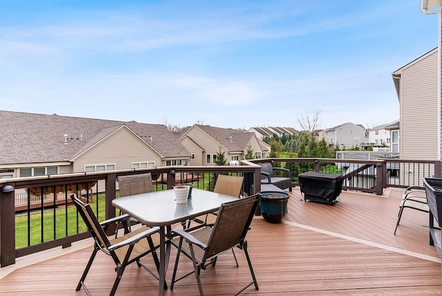 8079 Wildwood Ln, White Lake, MI 48386 - wooden deck with a residential view and outdoor dining area