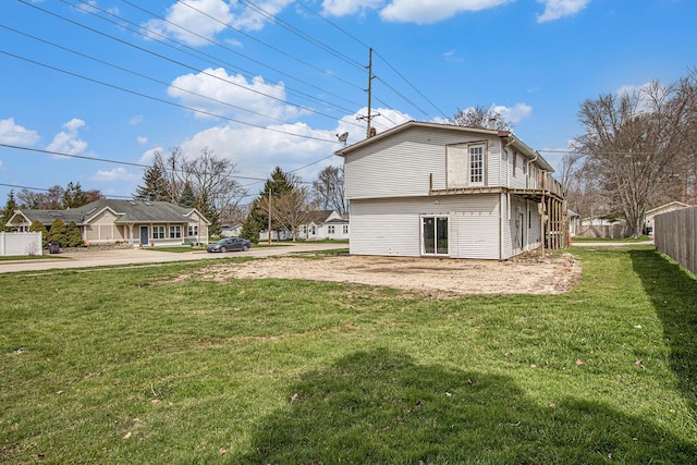 202 Poplar St, Three Oaks, MI 49128 - view of home's exterior featuring fence and a yard