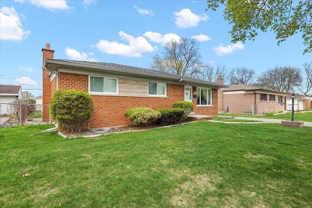 14953 Colpaert Dr, Warren, MI 48088 - single story home with brick siding, fence, a chimney, and a front lawn