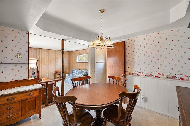 14953 Colpaert Dr, Warren, MI 48088 - dining space with light floors, a chandelier, and wallpapered walls