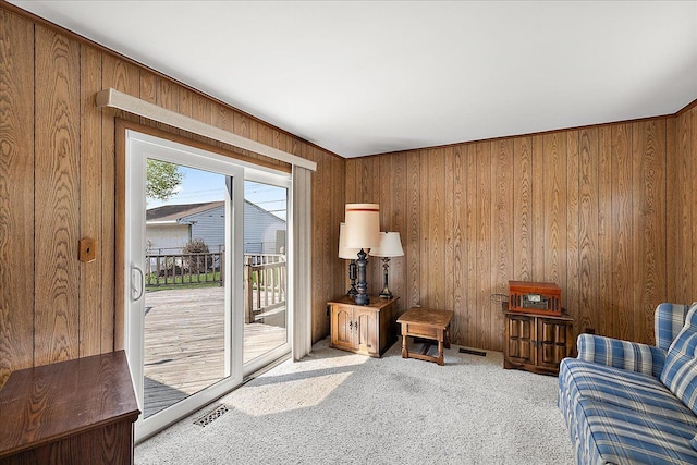 14953 Colpaert Dr, Warren, MI 48088 - living area with carpet flooring, wooden walls, and visible vents