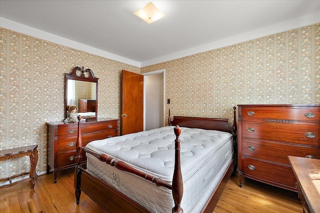 14953 Colpaert Dr, Warren, MI 48088 - bedroom with wallpapered walls and light wood-style floors