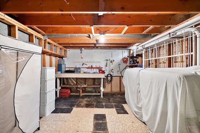 14953 Colpaert Dr, Warren, MI 48088 - unfinished basement featuring a workshop area and tile patterned floors