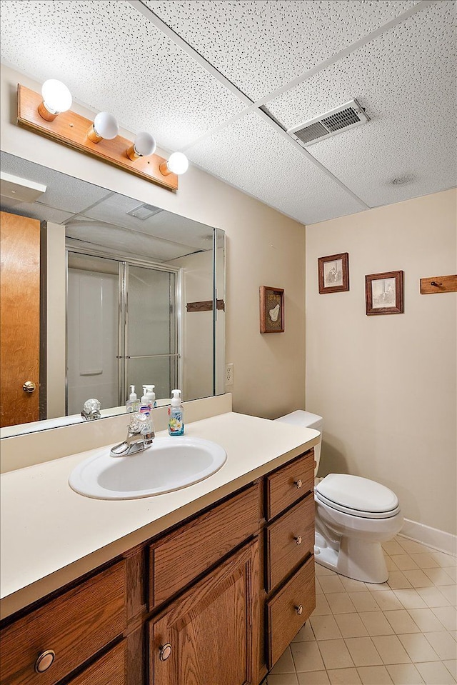 14953 Colpaert Dr, Warren, MI 48088 - full bath featuring vanity, toilet, tile patterned floors, a shower with door, and visible vents