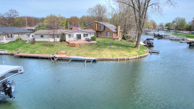 2103 Island Dr, Wayland, MI 49348 - dock area with a lawn and a water view