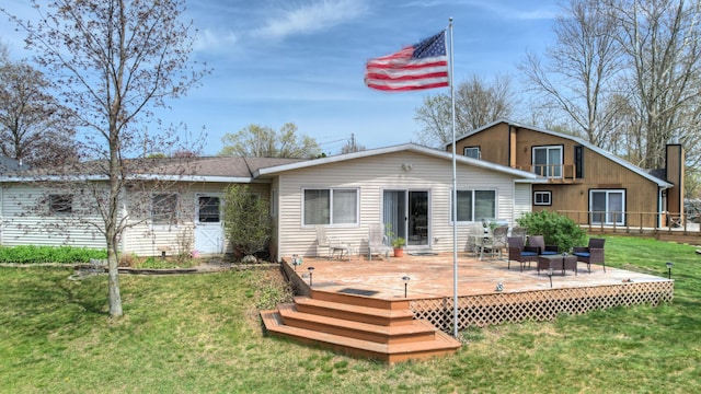 2103 Island Dr, Wayland, MI 49348 - back of house with a yard and a wooden deck