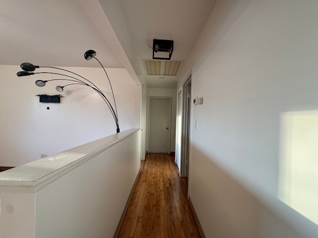hallway with wood finished floors