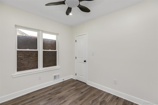 12061 Nashville St, Detroit, MI 48205 - empty room featuring baseboards, dark wood-type flooring, and ceiling fan