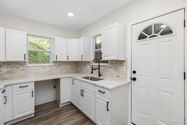 12061 Nashville St, Detroit, MI 48205 - kitchen featuring a sink, healthy amount of natural light, backsplash, and recessed lighting
