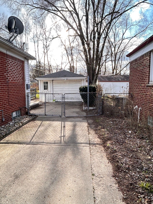13973 Brady, Redford, MI 48239 - view of yard with a gate, a garage, fence, and an outbuilding