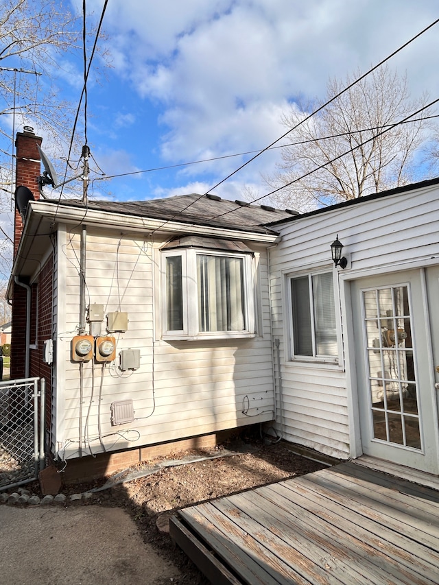 13973 Brady, Redford, MI 48239 - view of home's exterior with roof with shingles and a chimney
