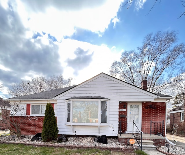 13973 Brady, Redford, MI 48239 - view of front of house featuring a chimney and brick siding