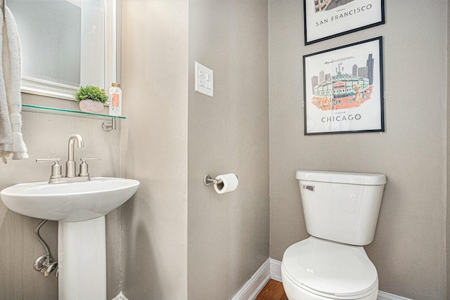 2569 Ridgewood Trl, Berrien Springs, MI 49103 - half bath with baseboards and toilet
