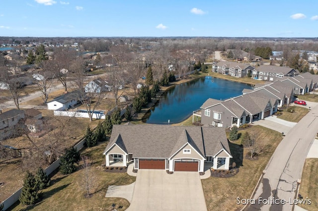 6501 Andres Xing Unit 14, Grandville, MI 49418 - aerial view featuring a water view and a residential view