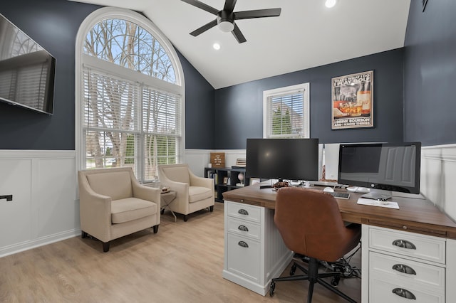 2693 Sanctuary Dr, Stevensville, MI 49127 - home office with light wood-style floors, a decorative wall, a wainscoted wall, and a ceiling fan