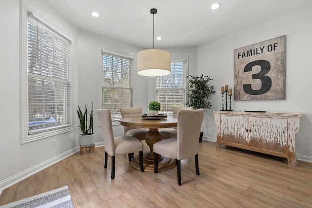 2693 Sanctuary Dr, Stevensville, MI 49127 - dining room featuring baseboards, wood finished floors, and recessed lighting