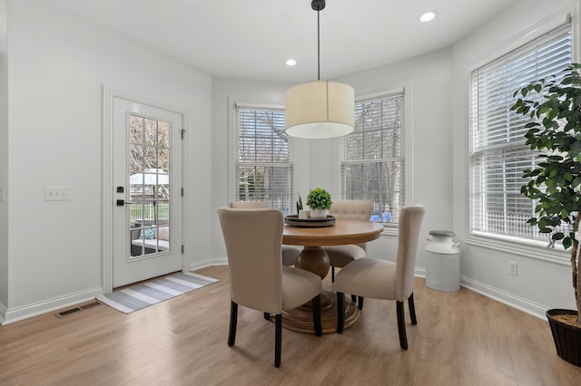 2693 Sanctuary Dr, Stevensville, MI 49127 - dining space with recessed lighting, light wood-style floors, visible vents, and baseboards