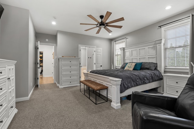 2693 Sanctuary Dr, Stevensville, MI 49127 - bedroom with recessed lighting, baseboards, light colored carpet, and ensuite bathroom