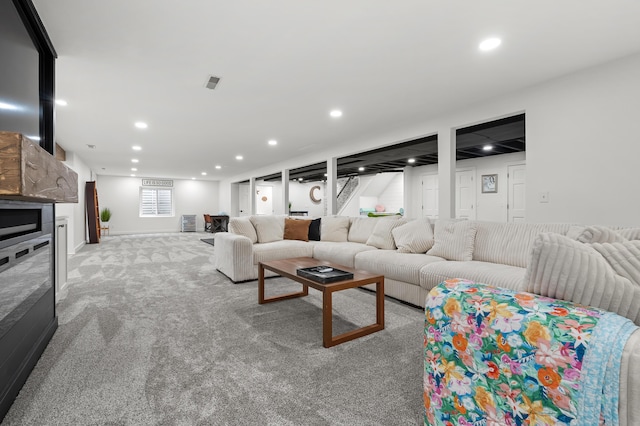 2693 Sanctuary Dr, Stevensville, MI 49127 - living area with recessed lighting, carpet floors, visible vents, and a fireplace