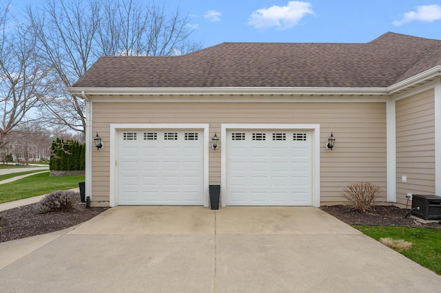2693 Sanctuary Dr, Stevensville, MI 49127 - garage with concrete driveway