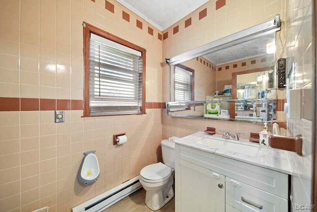 bathroom featuring tile walls, vanity, toilet, and baseboard heating