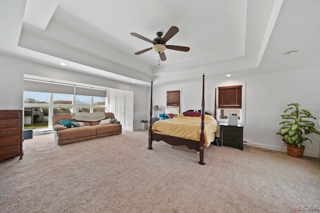 bedroom with a ceiling fan, carpet floors, recessed lighting, and a raised ceiling