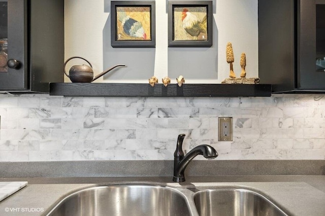 16191 4th Ln, Union Pier, MI 49129 - details with decorative backsplash and a sink