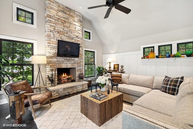 16191 4th Ln, Union Pier, MI 49129 - living area featuring a stone fireplace, a ceiling fan, and high vaulted ceiling