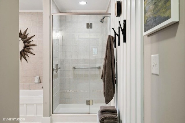 16191 4th Ln, Union Pier, MI 49129 - bathroom with a stall shower, ornamental molding, and a bathtub