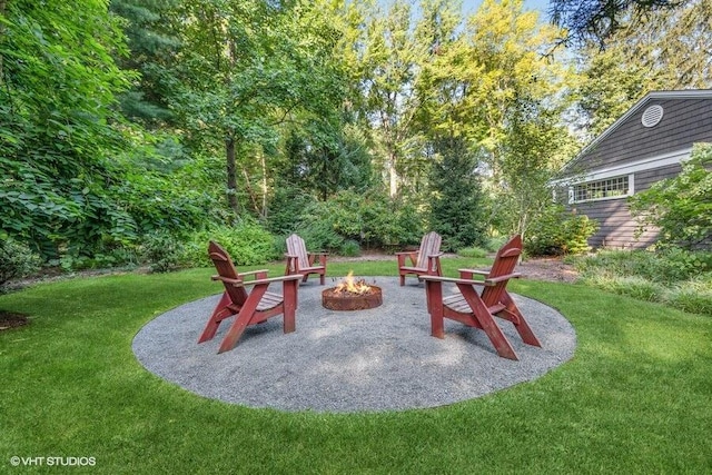 16191 4th Ln, Union Pier, MI 49129 - view of jungle gym featuring a lawn and an outdoor fire pit