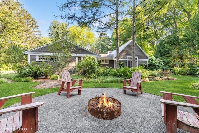 16191 4th Ln, Union Pier, MI 49129 - view of home's community featuring a yard, a patio, and an outdoor fire pit