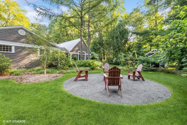 16191 4th Ln, Union Pier, MI 49129 - view of jungle gym featuring a patio area, a fire pit, and a yard