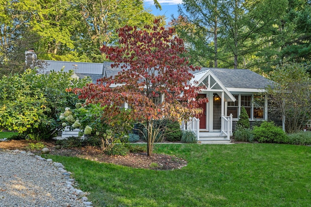 16191 4th Ln, Union Pier, MI 49129 - view of front of house with a shingled roof and a front yard