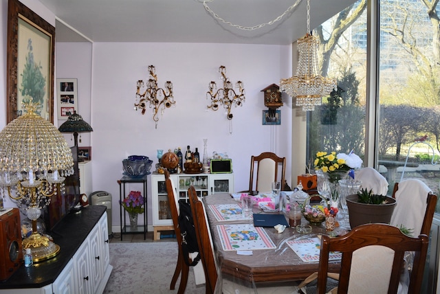 dining room with a chandelier