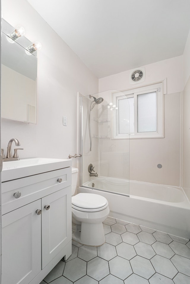 full bathroom with toilet, vanity, shower / washtub combination, and tile patterned floors