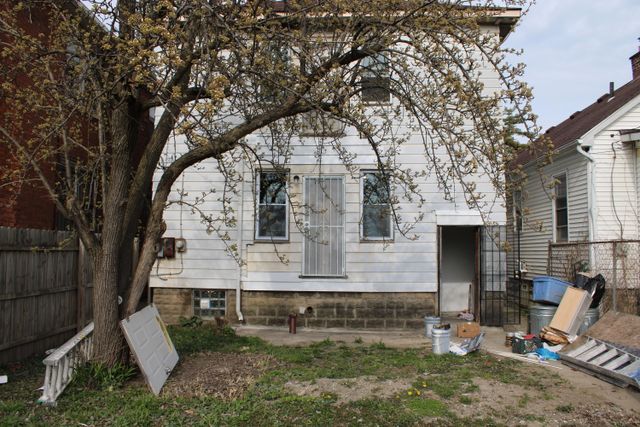 5815 Cadillac Ave, Detroit, MI 48213 - back of house featuring fence