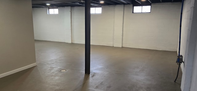 below grade area with concrete block wall