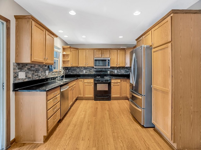 kitchen with light wood finished floors, tasteful backsplash, recessed lighting, open shelves, and appliances with stainless steel finishes