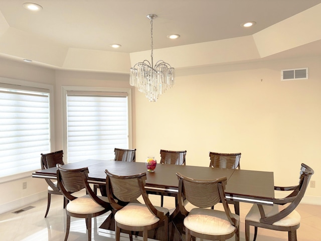 dining room with baseboards, a wealth of natural light, visible vents, and recessed lighting