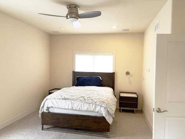 bedroom featuring baseboards, a ceiling fan, carpet flooring, and visible vents